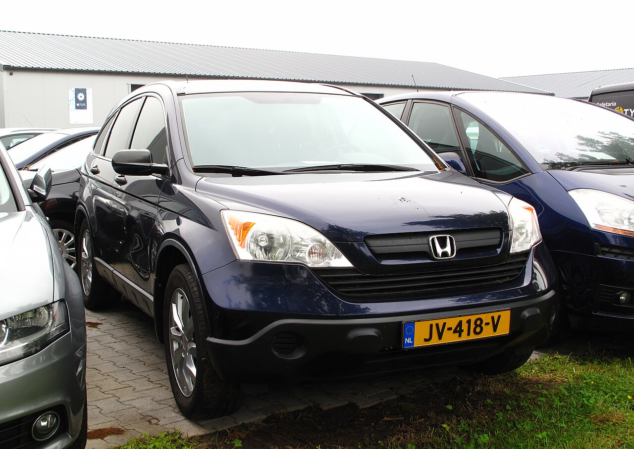 Honda CR-V, серый компактный кроссовер.